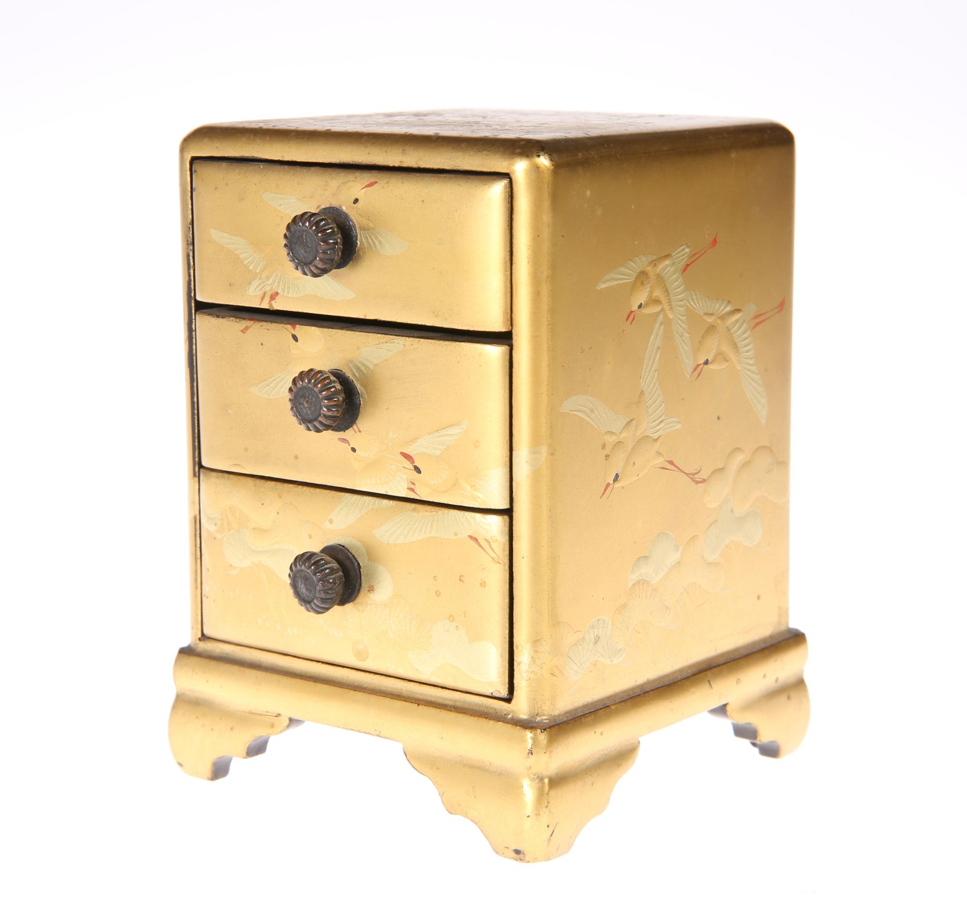 A JAPANESE GOLD LACQUER MINIATURE CHEST OF DRAWERS, MEIJI PERIOD, decorated to all visible areas