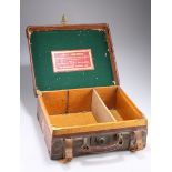 ~ A W.W. GREENER LEATHER-BOUND CARTRIDGE CASE, trade label to underside of lid, oak-lined. The