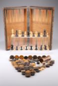 AN EARLY 20TH CENTURY LEATHER-BOUND CHESS AND BACKGAMMON BOARD, the hinged box in the form of two
