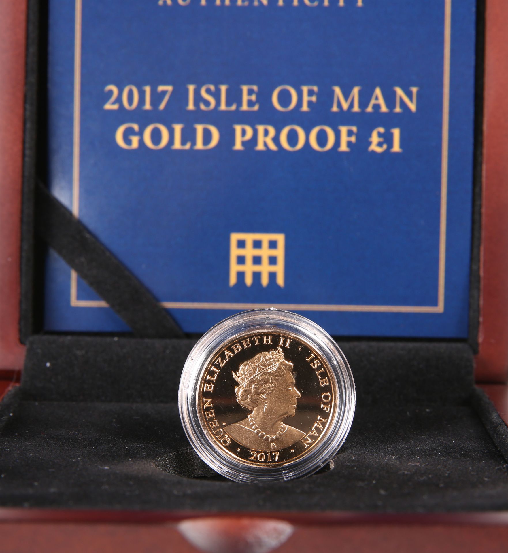 A 2017 ISLE OF MAN GOLD PROOF ONE POUND COIN, boxed with certificate.The absence of a Condition