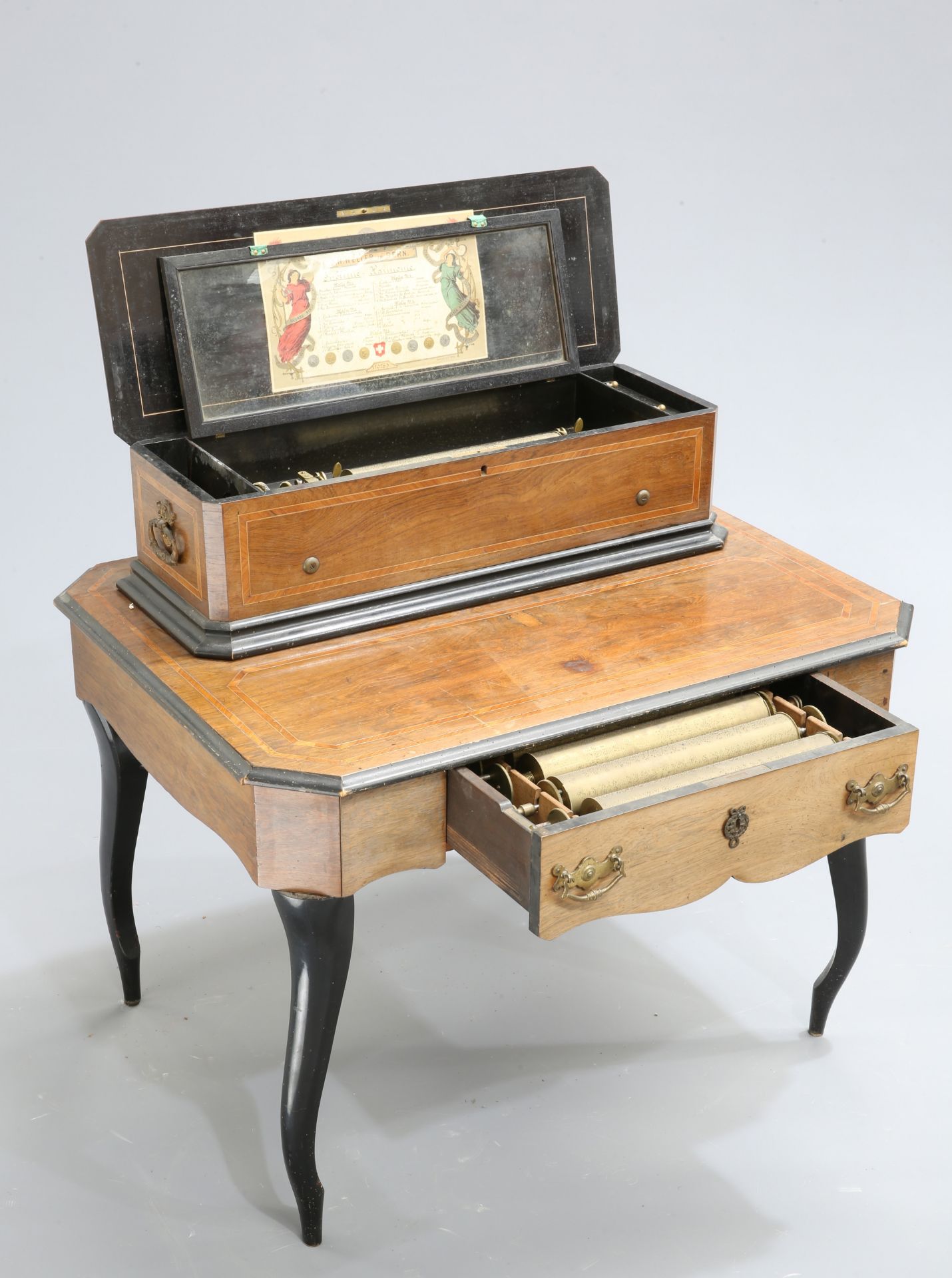 ~ A 19TH CENTURY INLAID ROSEWOOD MUSIC BOX ON TABLE, the music box with 14-inch cylinder, signed J.