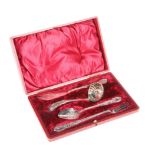 A LATE VICTORIAN SILVER-PLATED SERVING SET, including sifting ladle, pickle fork and butter knife,