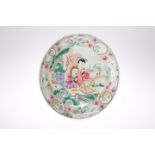 A CHINESE FAMILLE ROSE SAUCER DISH, circular, painted to the well with two figures reading at a