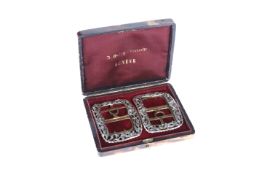 A FINE PAIR OF GEORGIAN DIAMOND SET SHOE BUCKLES, the openwork frames with rose-cut diamond set