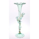 A VICTORIAN GREEN GLASS EPERGNE, the central trumpet-shaped vase surrounded by four small conforming