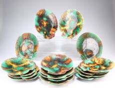 A SET OF SIXTEEN WEDGWOOD MAJOLICA SCALLOP SHELL PLATES, CIRCA 1860-70, with mottled brown, green