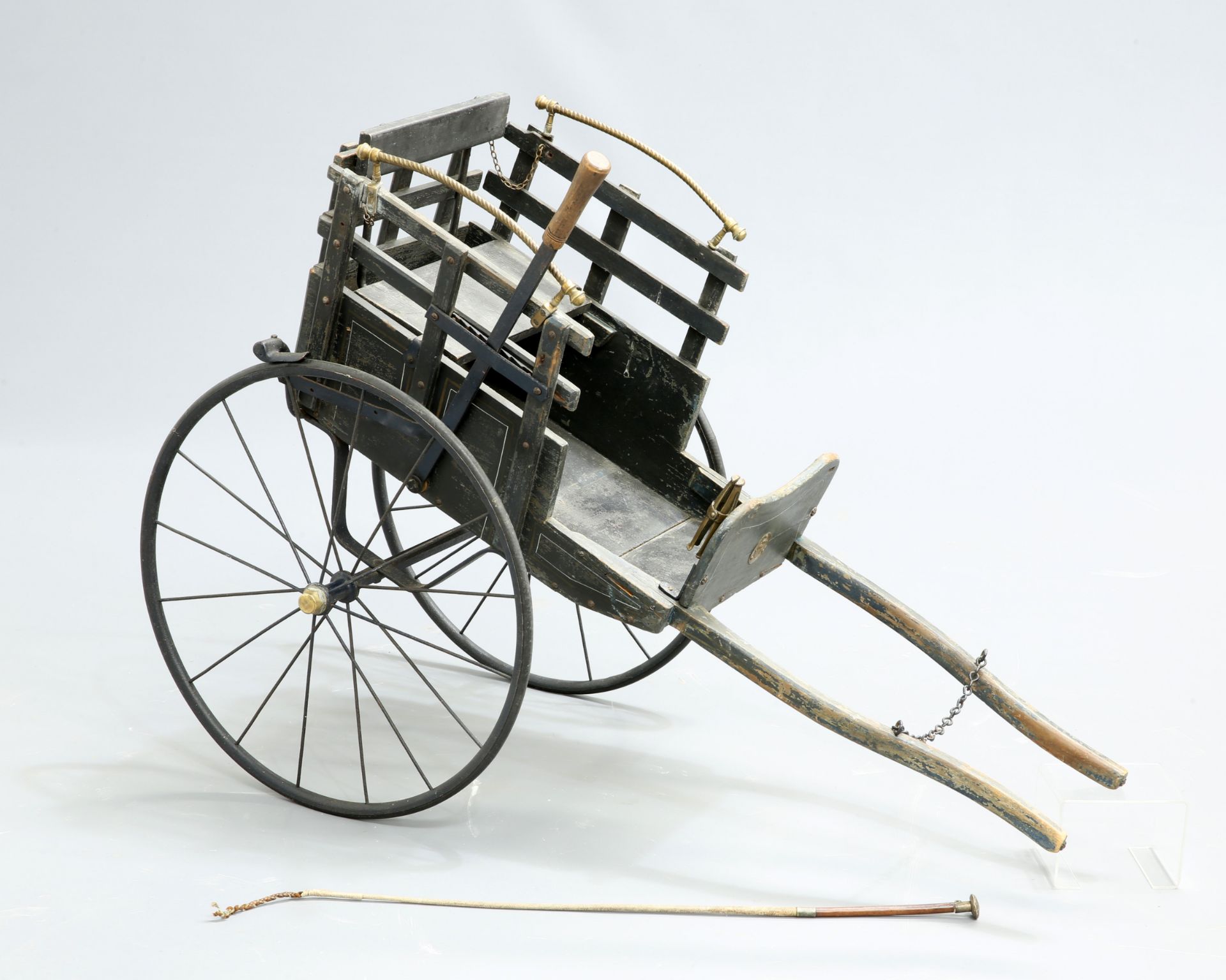 A VICTORIAN SCOTTISH BRASS MOUNTED AND PAINTED DOG CART, fitted with a brake and accompanied by a