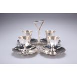 AN EDWARDIAN SILVER FOUR PIECED EGG CRUET SUITE, by Goldsmiths & Silversmiths Co Ltd, London 1903,