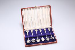 A CASED SET OF EAST ASIAN SILVER METAL COFFEE SPOONS, with finials topped with palms, birds and