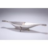 A GEORGE V OMAR RAMSDEN SILVER DISH, London 1921, the planished navette shape with pierced foliate