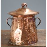AN ARTS AND CRAFTS COPPER TWO-HANDLED COAL BIN AND COVER, by William Soutter & Sons Co., the domed