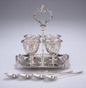 AN EDWARDIAN SILVER PIERCED EGG CRUET SUITE WITH SPOONS, by James Dixon & Sons Ltd, Sheffield