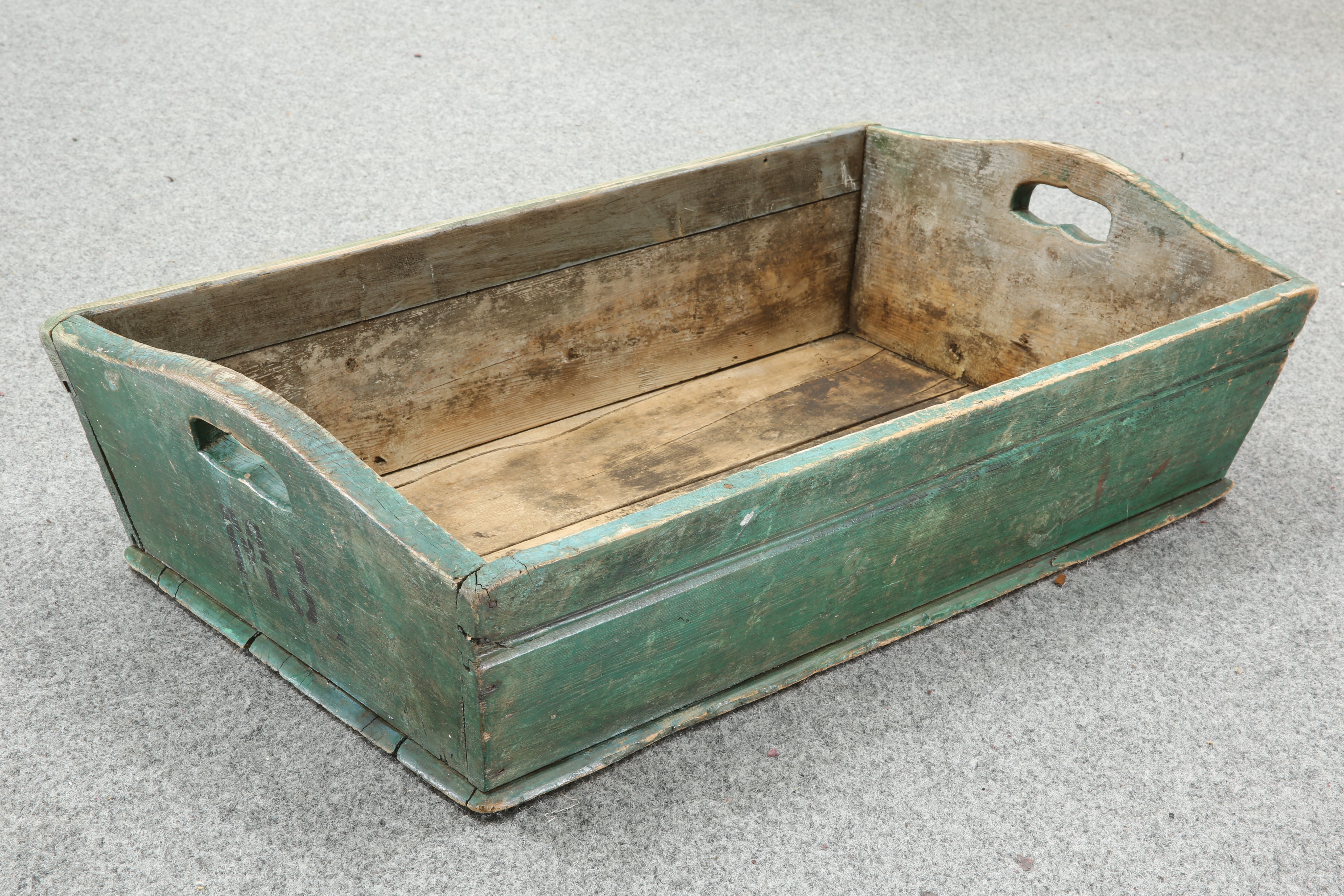 A VICTORIAN PAINTED TRUG, with cut-out handles. 76.5cm long