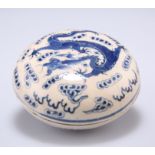 A CHINESE BLUE AND WHITE 'DRAGON' BOX AND COVER, circular, the cover painted with a scaly five-