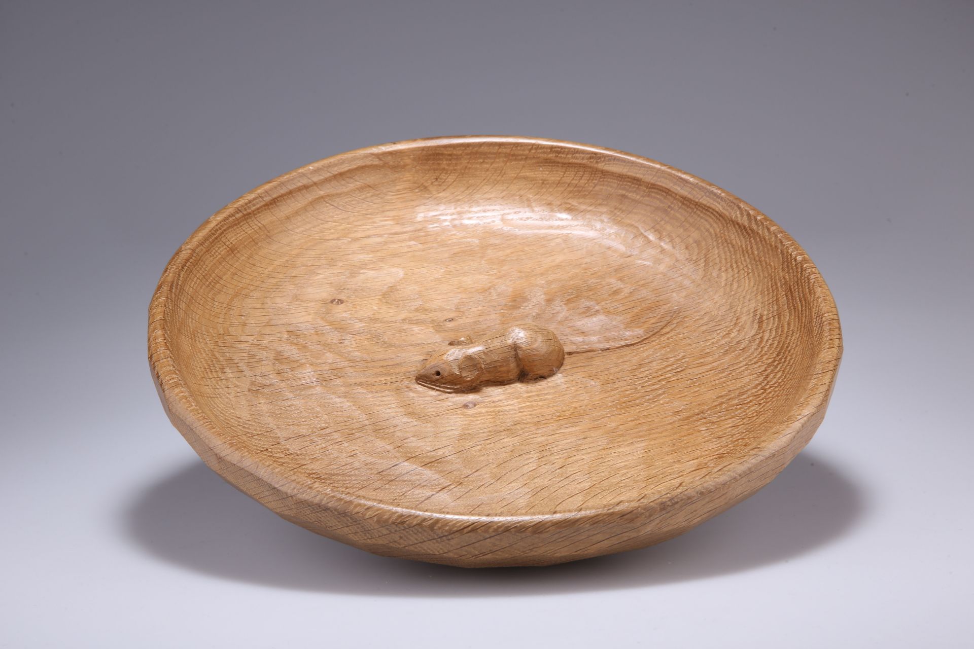 ROBERT THOMPSON OF KILBURN A MOUSEMAN OAK FRUIT BOWL, circular, adzed inside and out, carved mouse