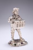 A VICTORIAN SILVER STREET MUSICIAN, by Singleton, Benda & Co Ltd, London 1900, modelled