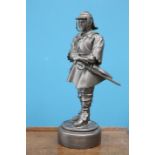 A BRONZED SCULPTURE OF A MILITARY FIGURE, signed 'Elton' and dated 1990. 29cm high