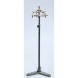 AN UNUSUAL CAST IRON AND BRONZE COAT STAND, EARLY 20TH CENTURY, the bronze domed superstructure