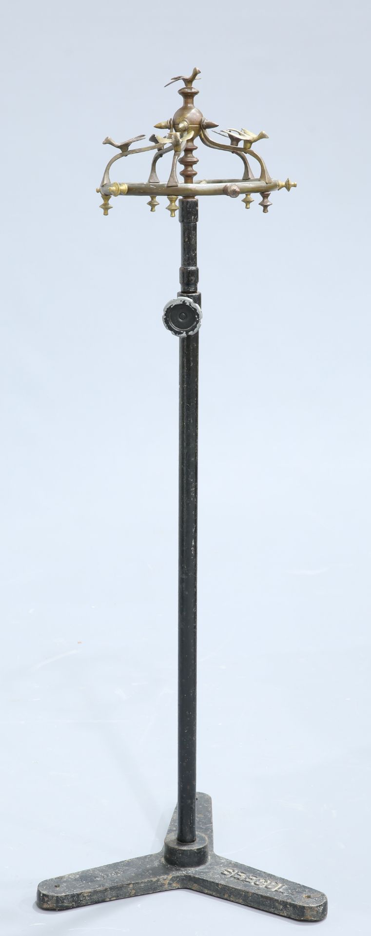 AN UNUSUAL CAST IRON AND BRONZE COAT STAND, EARLY 20TH CENTURY, the bronze domed superstructure