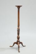 ADAM STYLE MAHOGANY TORCHERE, CIRCA 1900, with reeded and wheat-carved stem, raised on a tripod base