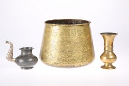 A LARGE ISLAMIC BRONZE BOWL, decorated with script; together with two other Islamic items, A POT