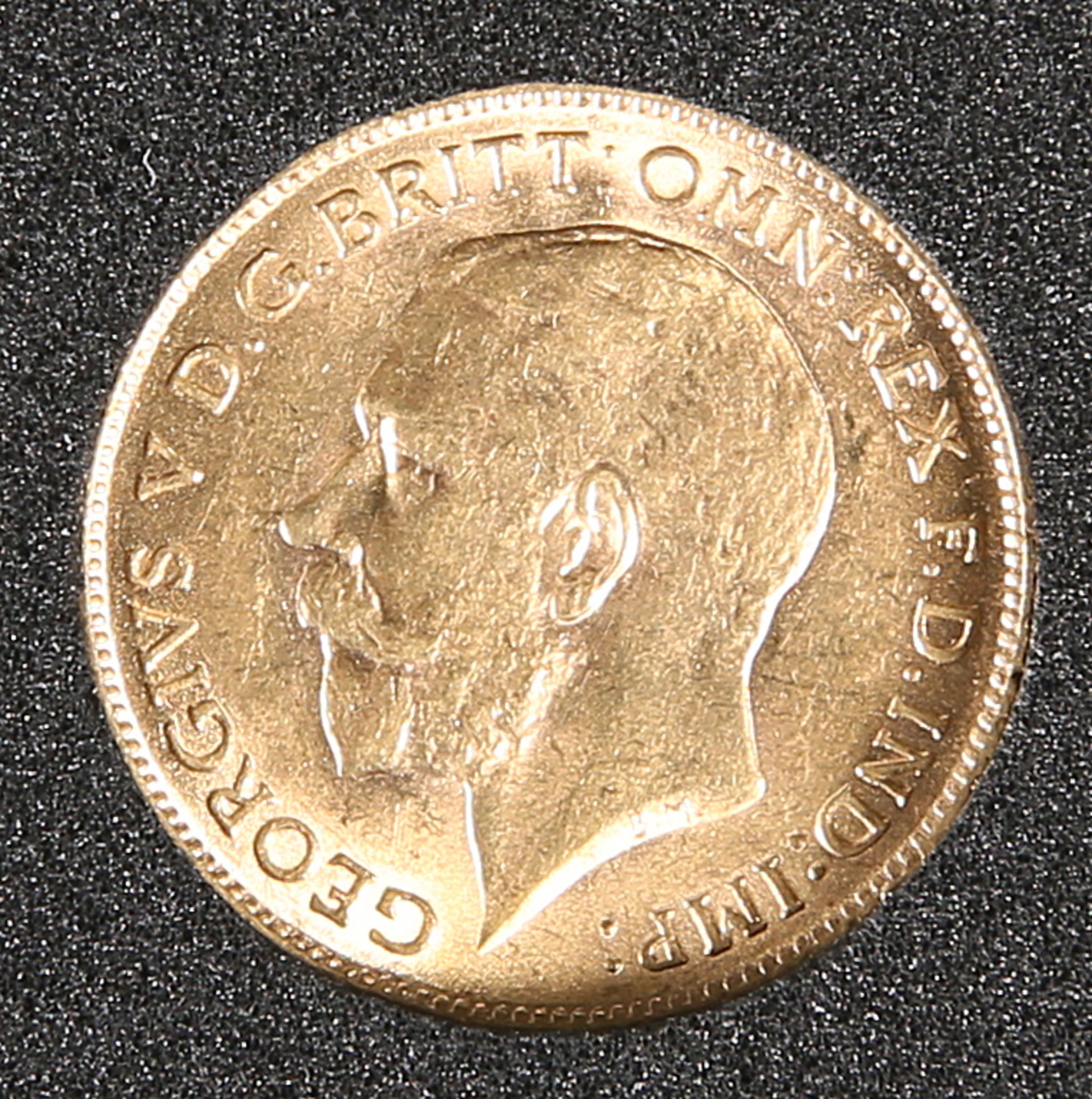 A 1911 HALF SOVEREIGN.