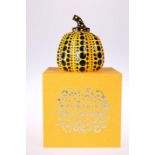 YAYOI KUSAMA (JAPANESE, BORN 1929) 'PUMPKIN' (ORANGE AND BLACK), cast resin, in presentation box.