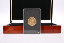 A GEORGE V SOVEREIGN, 1926, in plastic capsule, presentation box and outer card box.The absence of a