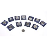 ELEVEN SILVER PROOF COINS, CIRCA 20TH CENTURY, in plastic capsules, total weight 10 troy ounces;