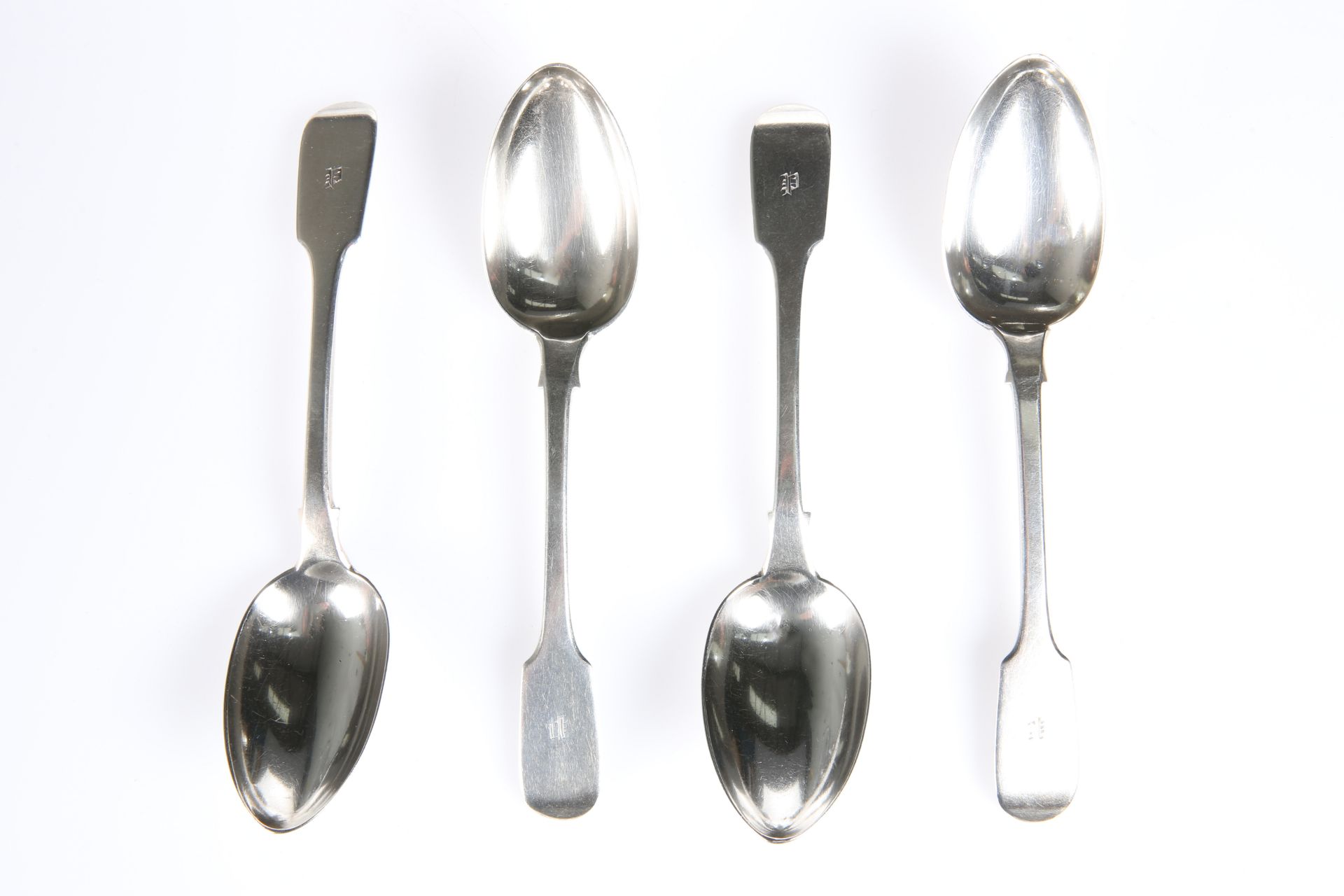 A SET OF FOUR VICTORIAN PROVINCIAL SILVER DESSERT SPOONS, by James Barber & William North, York