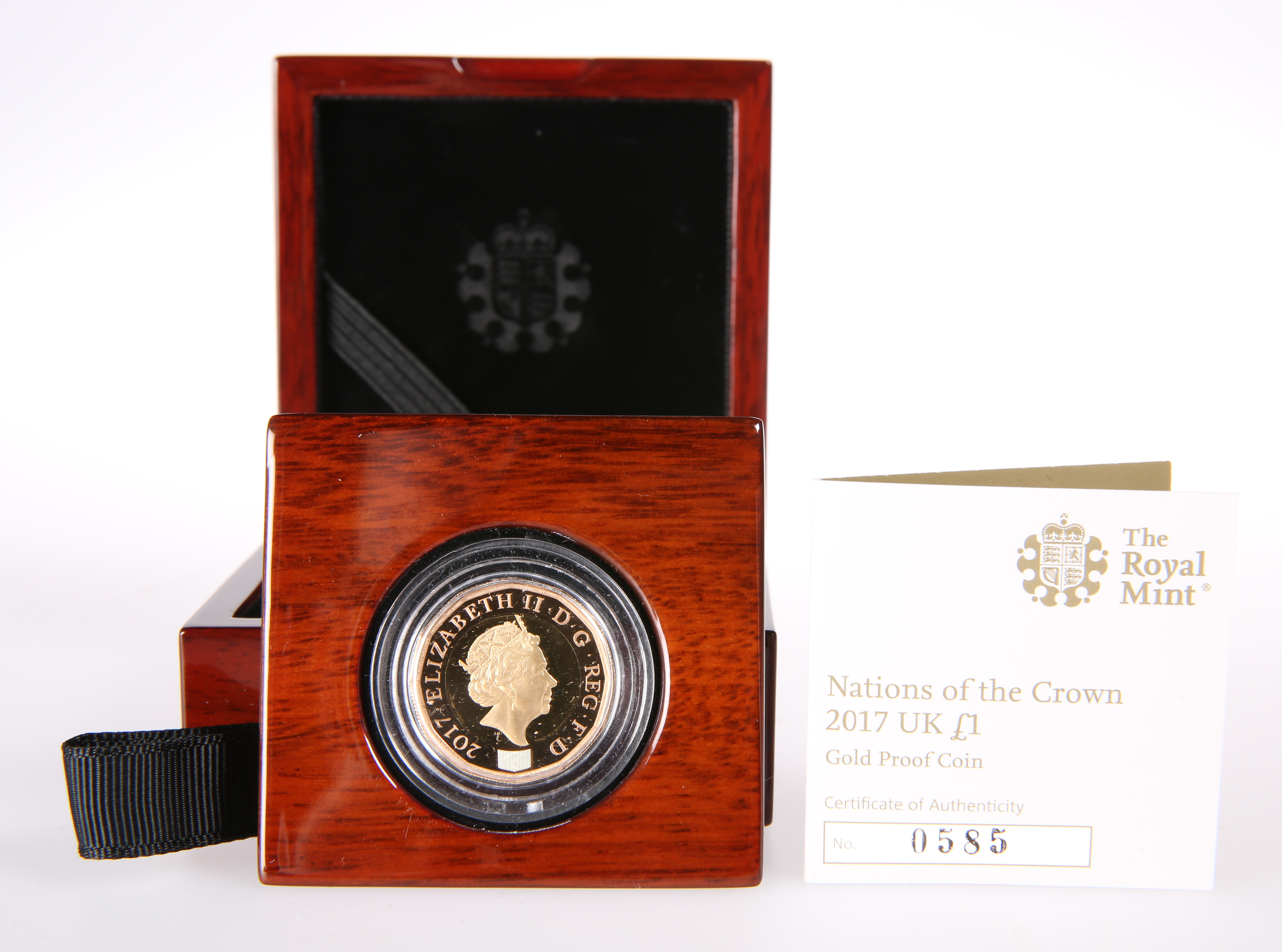 A ROYAL MINT "NATIONS OF THE CROWN" 2017 PROOF ONE POUND COIN, no. 0585, boxed with certificate.