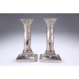 A PAIR OF VICTORIAN SILVER CANDLESTICKS, by Hawksworth, Eyre & Co Ltd, Sheffield 1898 and 1899, in