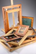 ~ A GROUP OF COUNTRY HOUSE PICTURE FRAMES, including three maple frames, (a/f).