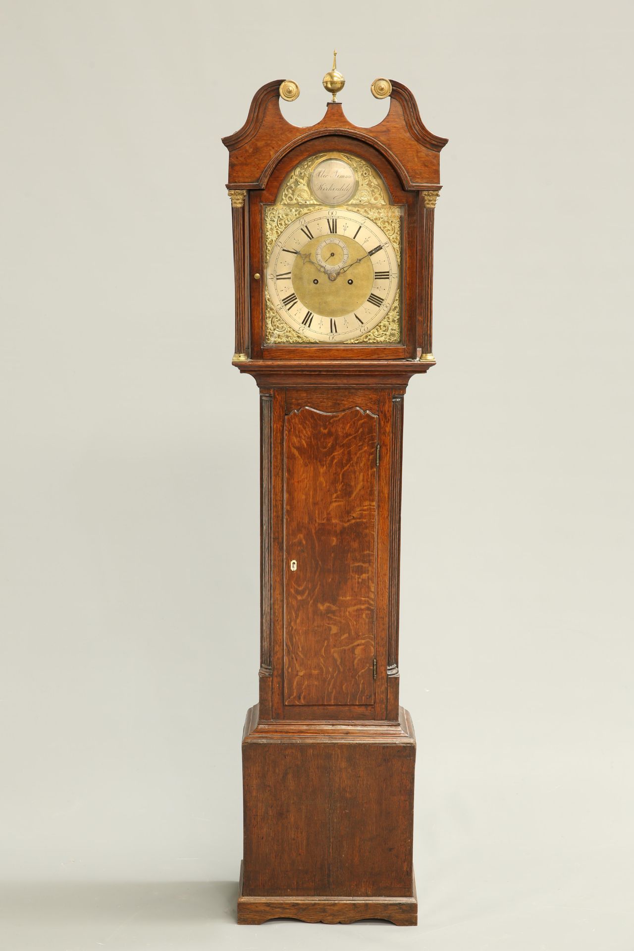 A GEORGE III OAK EIGHT-DAY LONGCASE CLOCK, the 12-inch brass break-arch dial signed in the arch '