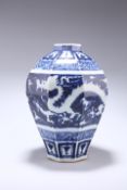A PROBABLY 19TH CENTURY CHINESE BLUE AND WHITE VASE, inverted panelled baluster form, decorated with