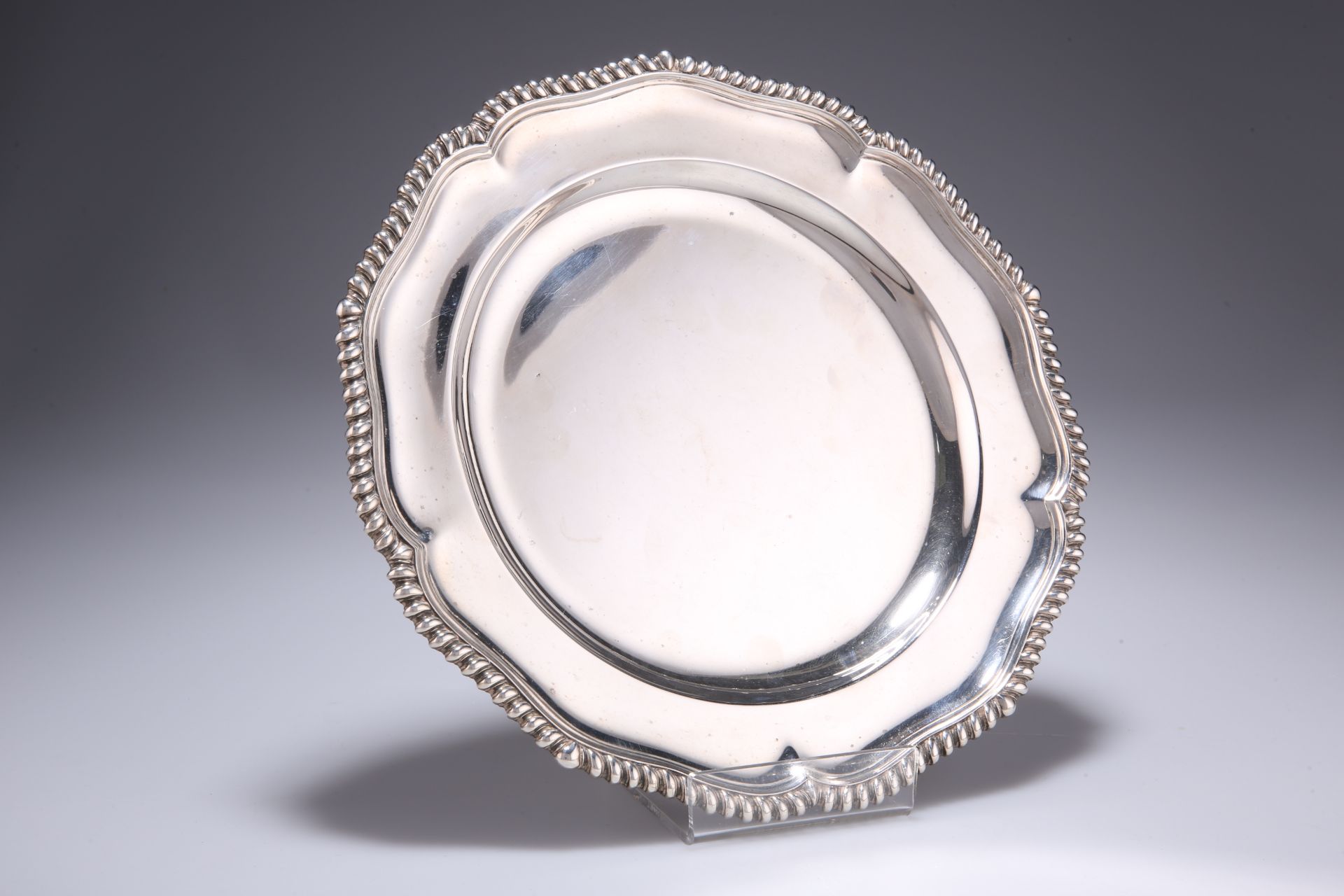 A VICTORIAN SILVER DINNER PLATE, by FB Thomas & Co, London 1878, with gadrooned edge, underside