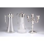 TWO SILVER-PLATE MOUNTED CLARET JUGS, the first with bamboo-form handle, the second with mask-spout;