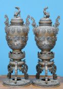 A LARGE PAIR OF JAPANESE BRONZE KORO, MEIJI PERIOD, the ovoid two-handled vases cast with lappets