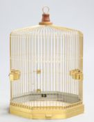 ~ A LARGE COUNTRY HOUSE BRASS BIRDCAGE, octagonal. 88cm high, 62.5cm wide