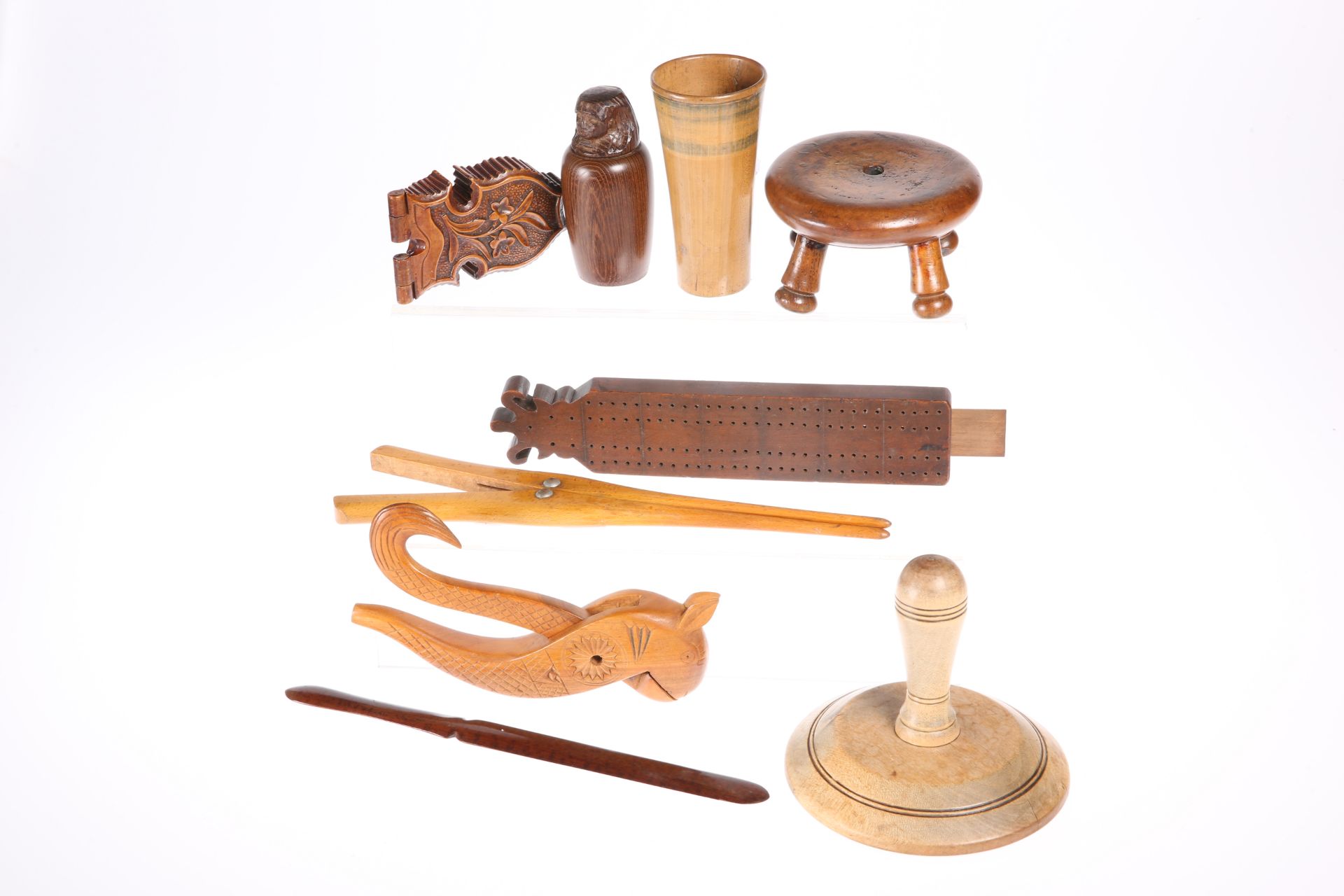 TREEN: A LARGE COLLECTION OF TREEN, including a 19th Century carved pocket watch holder, a