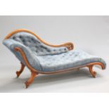 A VICTORIAN WALNUT CHAISE LONGUE, of elegant scrolling form with deep buttoned upholstery, raised on