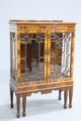 A GEORGIAN STYLE MAHOGANY CABINET ON STAND, EARLY 20TH CENTURY, with a pair of astragal glazed