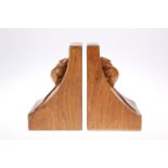 ROBERT THOMPSON OF KILBURN A PAIR OF MOUSEMAN OAK BOOKENDS, of characteristic form, adzed, carved