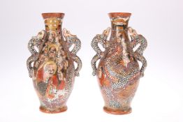 A PAIR OF JAPANESE SATSUMA VASES, MEIJI PERIOD, CIRCA 1900, of ovoid form with serpent handles,