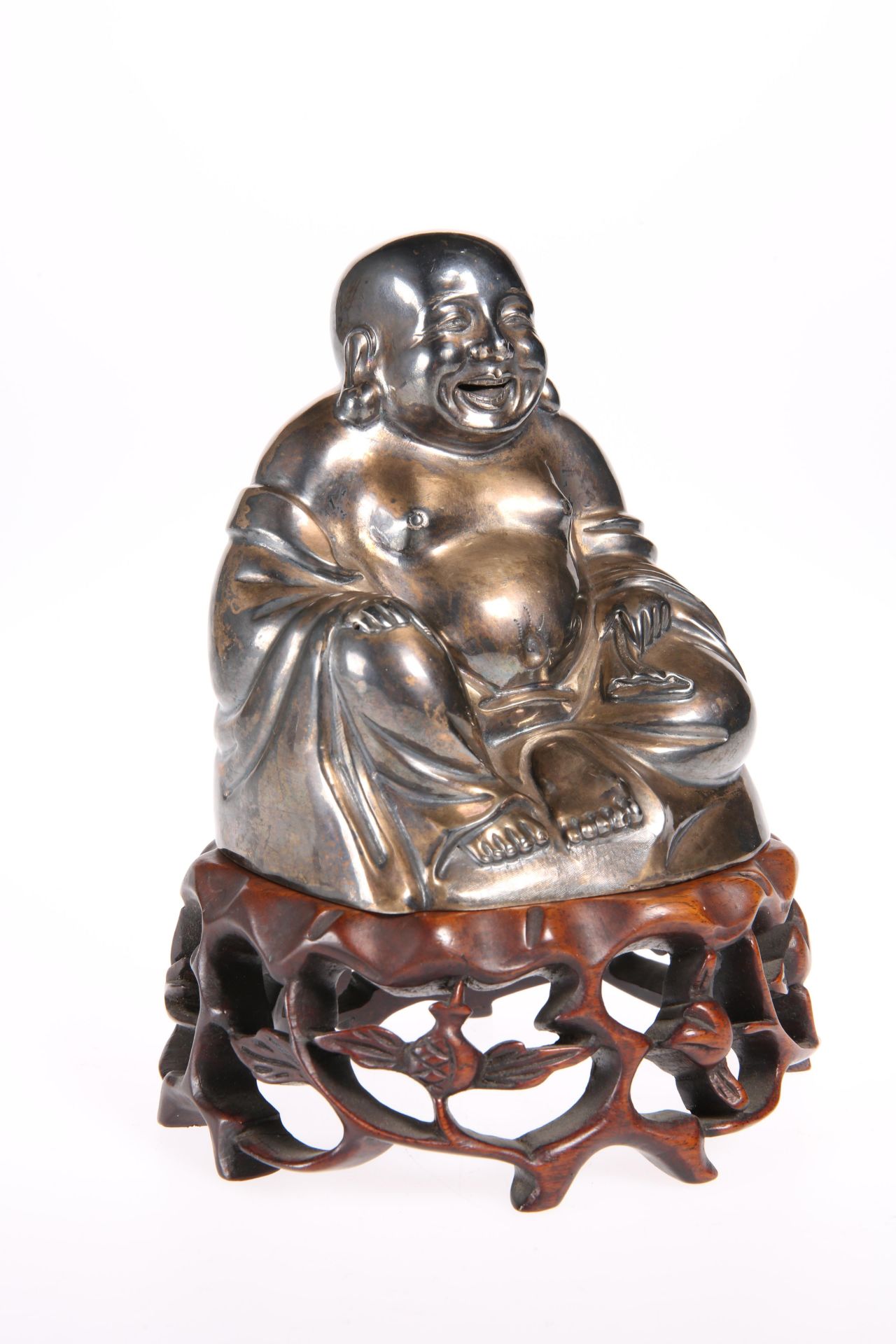 A FINE CHINESE SILVER BUDDHA, signed, the hollow figure modelled sitting with smiling expression,