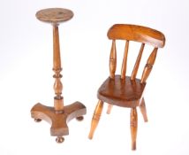 A VICTORIAN MINIATURE CHAIR AND TABLE, the chair with spindle back and baluster legs, the table with