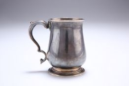 A GEORGE III SILVER CUP, maker ID, London 1769, of baluster form with moulded foot and S-scroll