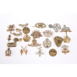 ~ A COLLECTION OF TWENTY-FIVE MILITARY BADGES AND BUTTONS. (25)