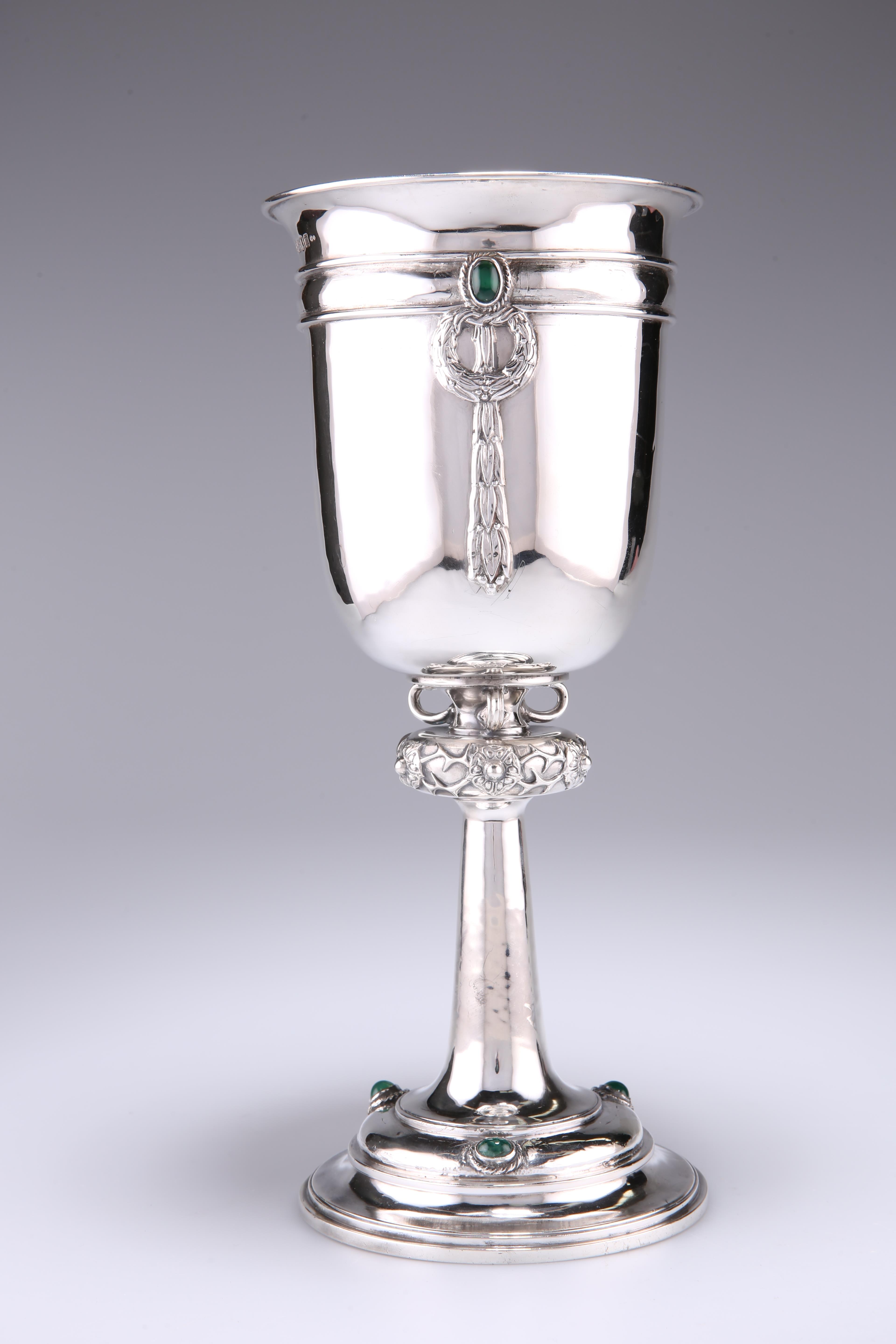A GEORGE V SILVER ALWYN CARR CHALICE, London 1927, the flared chalice bowl embellished with inset