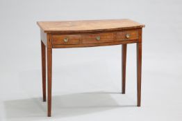 A REGENCY MAHOGANY SIDE TABLE, bow-fronted, the rosewood crossbanded top above a long drawer with